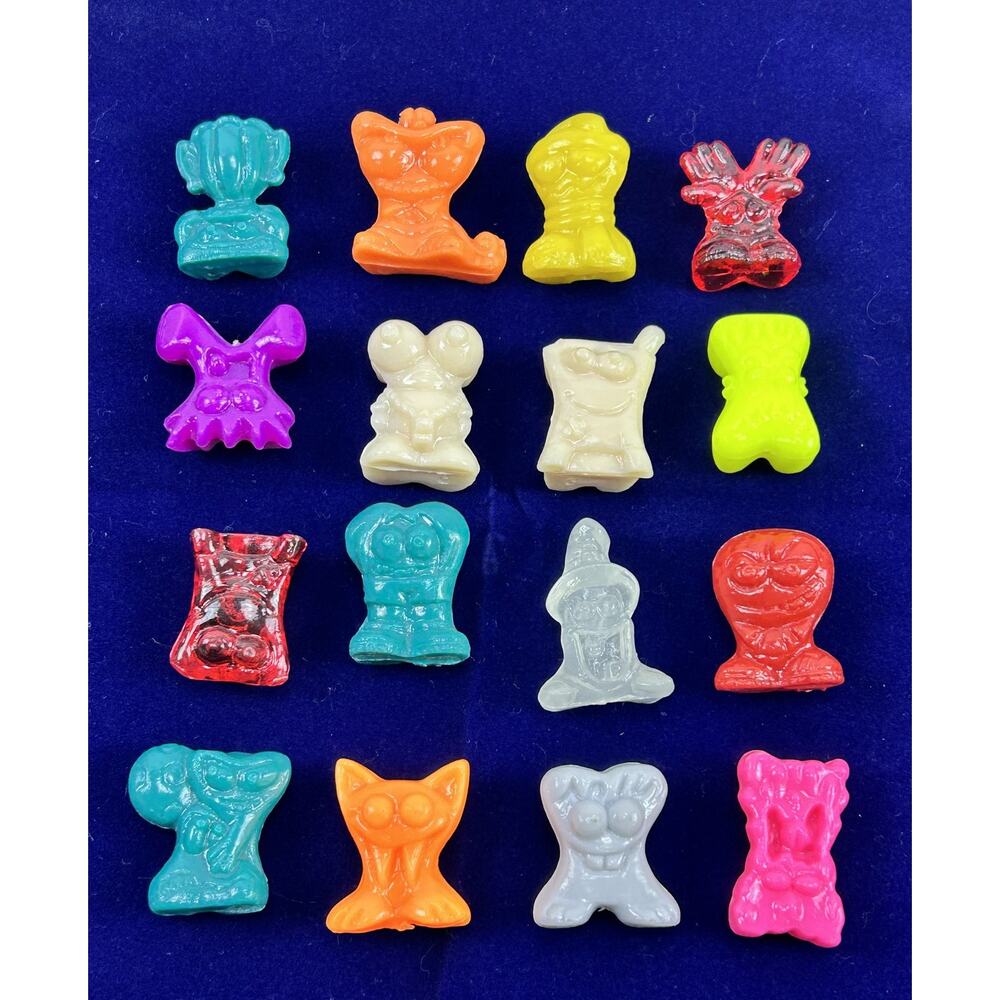 Vintage Crazy Bones Figures Lot of 16 with Coffin Case Glo Worm Monster Gogo's
